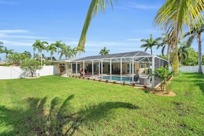 Outdoor pool, a heated pool - Heated Pool, 4BR 3BA, Comfortable Cape Oasis (Cape Coral)