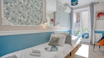 3 bedrooms, desk, iron/ironing board, travel crib