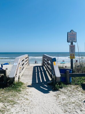 On the beach, sun-loungers, beach towels