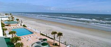 On the beach, sun-loungers, beach towels