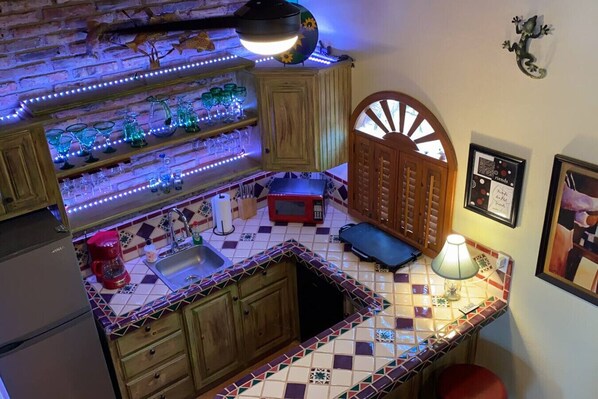 Fridge, microwave, coffee/tea maker, toaster