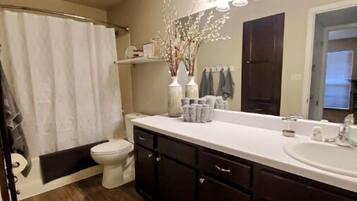 Hair dryer, towels, soap, shampoo