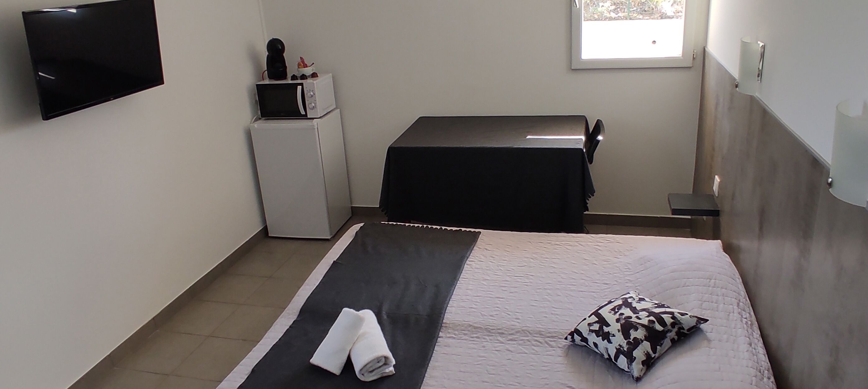 mini-fridge, microwave, espresso maker, electric kettle