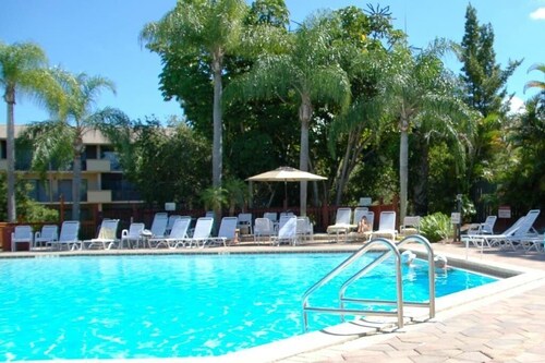 Near beach, view tropical plantings from 4th floor privacy, + pickleball courts!