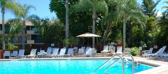 Near beach, view tropical plantings from 4th floor privacy, + pickleball courts!