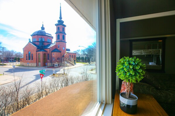Enjoy a serene view of the historic church from the comfort of your room.