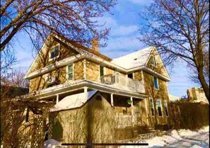 Enjoy the serene views from the second-floor balcony of this charming home.