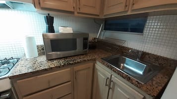 Fridge, oven, coffee/tea maker, toaster