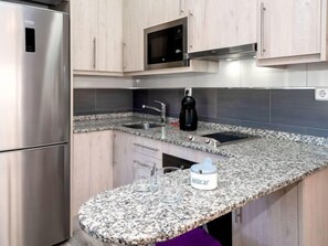 Fridge, microwave, oven, high chair