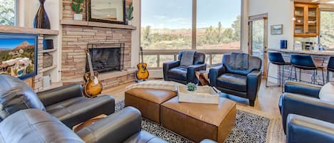 Smart TV, fireplace, foosball, books
