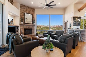 Smart TV, fireplace, table football, books