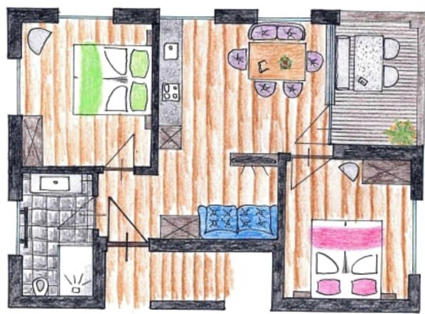 Plano de planta que muestra una cocina, comedor, dos dormitorios y un baño.