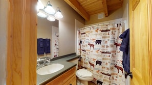 Bathtub, hair dryer, towels