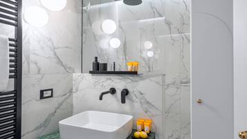 Comfort Room | Bathroom | Shower, rainfall showerhead, designer toiletries, hair dryer