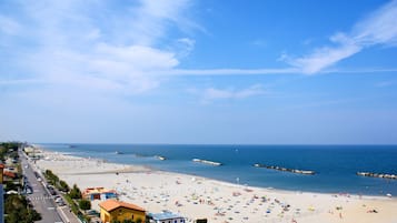 On the beach, white sand