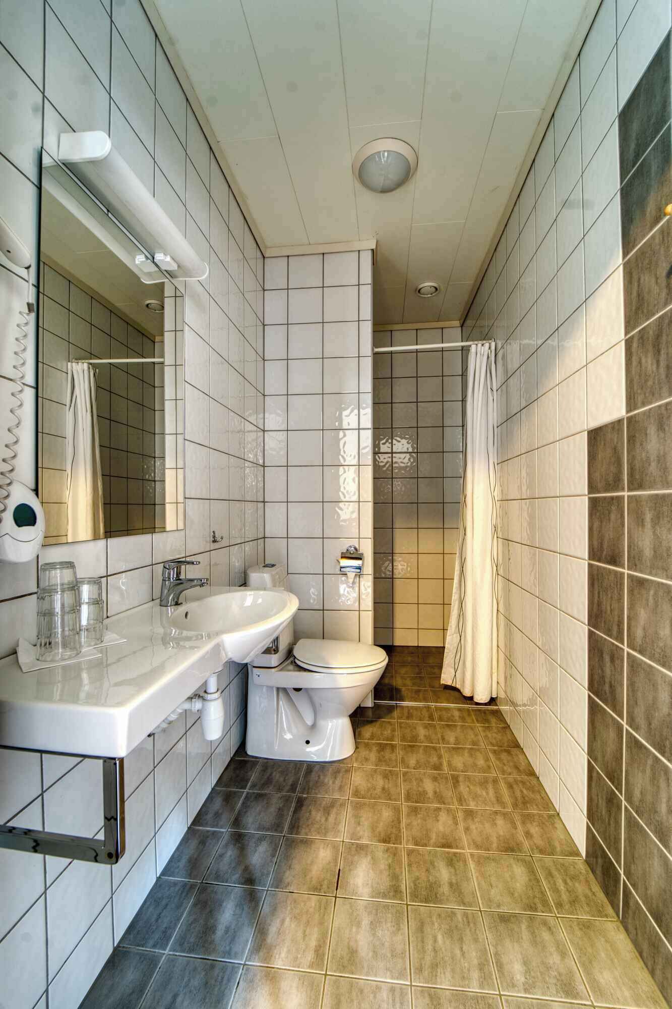 shower, hair dryer, heated floors, towels