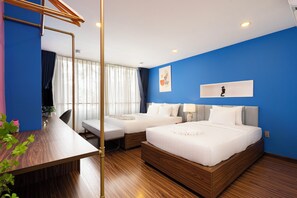 A hotel room with two beds, a desk, and a large window with curtains. - Mari Queen Hotel - Suong Nguyet Anh (Ho Chi Minh City)