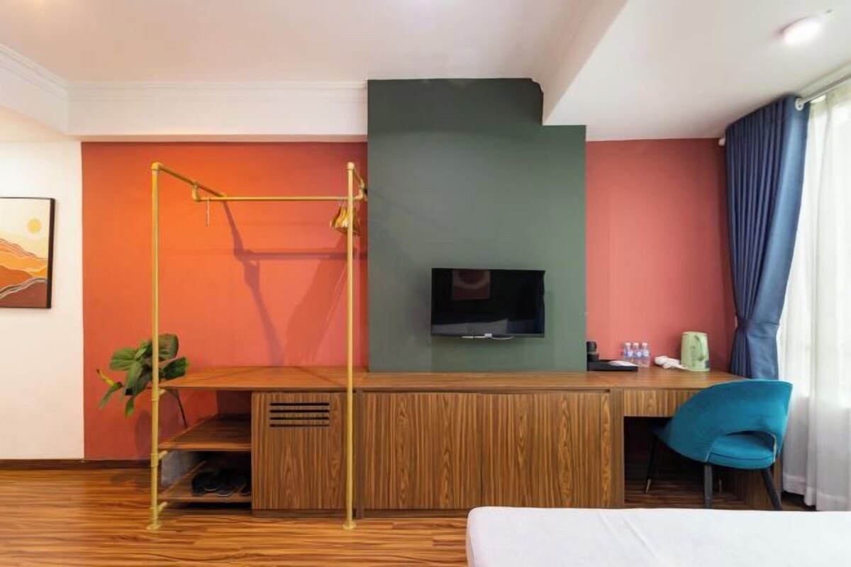 Desk, laptop workspace, blackout curtains, iron/ironing board