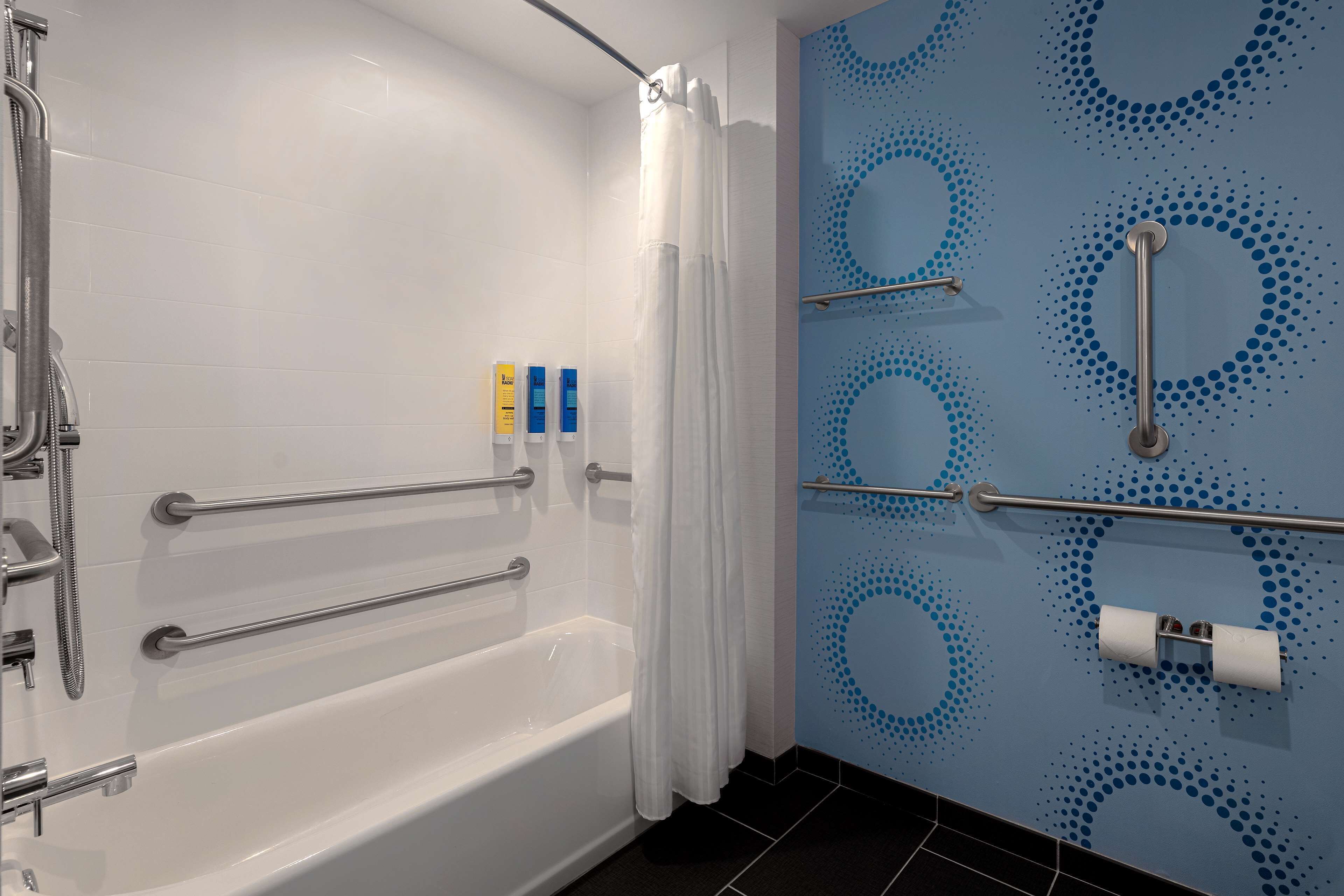 eco-friendly toiletries, hair dryer, towels, soap