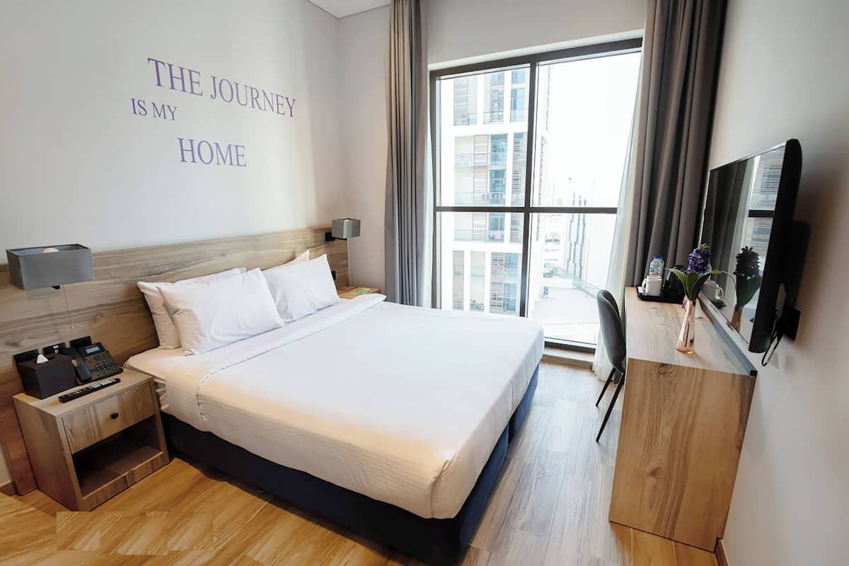 Premium bedding, pillow-top beds, minibar, in-room safe