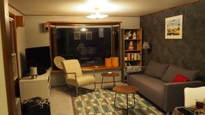 TV, DVD player, books, video library