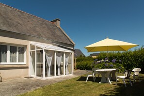 Véranda d'entrée ou pour prendre un café en hiver au soleil 