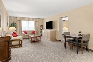 Executive Room | Living area | 55-inch LED TV with satellite channels, TV, iPod dock