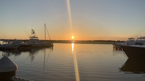 A marina with boats docked at sunset. - Hidden Gem on Seabrook Island-visit our fabulous beaches on this magical island! (Seabrook Island)