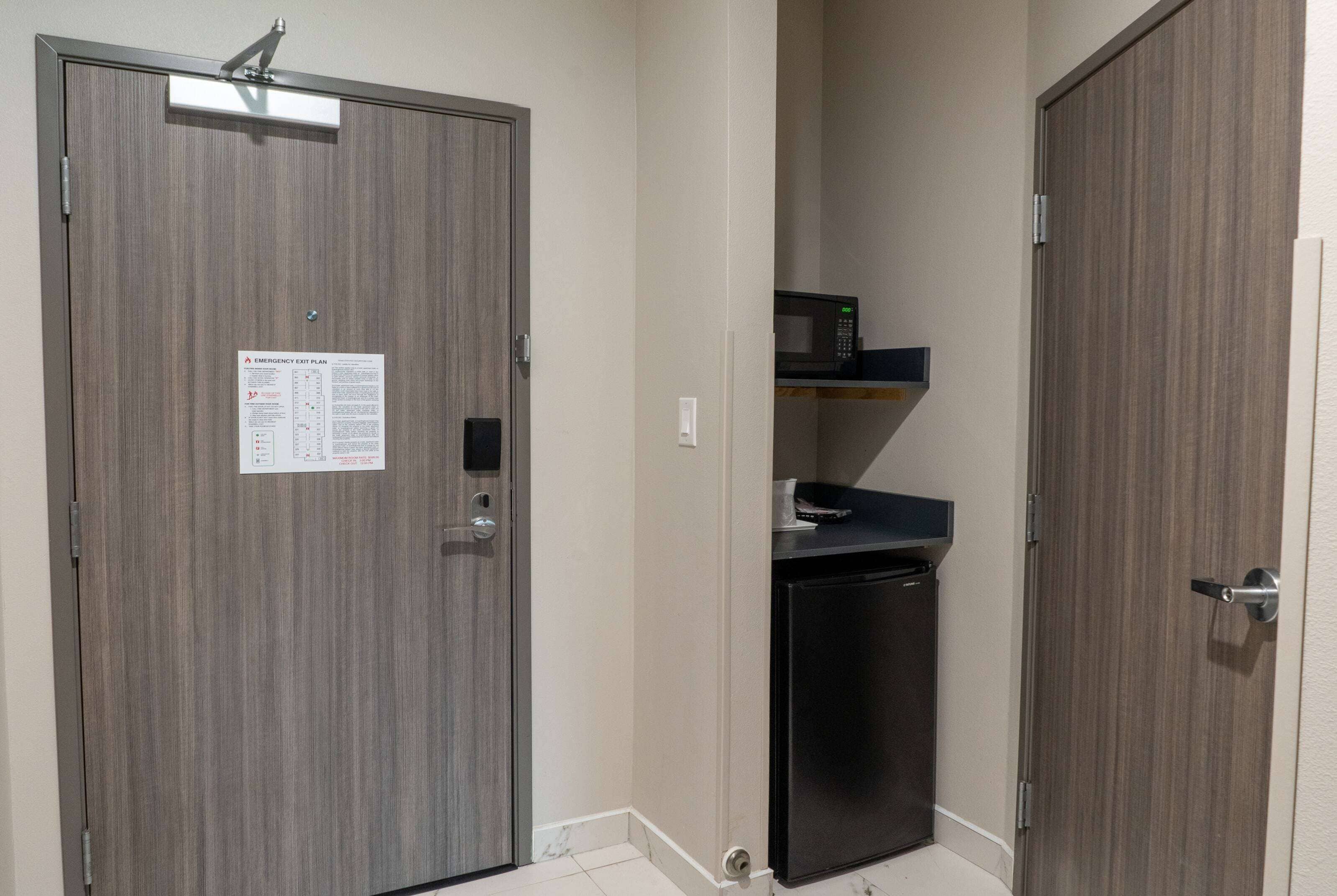 pillow-top beds, desk, laptop workspace, blackout curtains