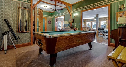 Historic prohibition Lodge next to golf course with private beach