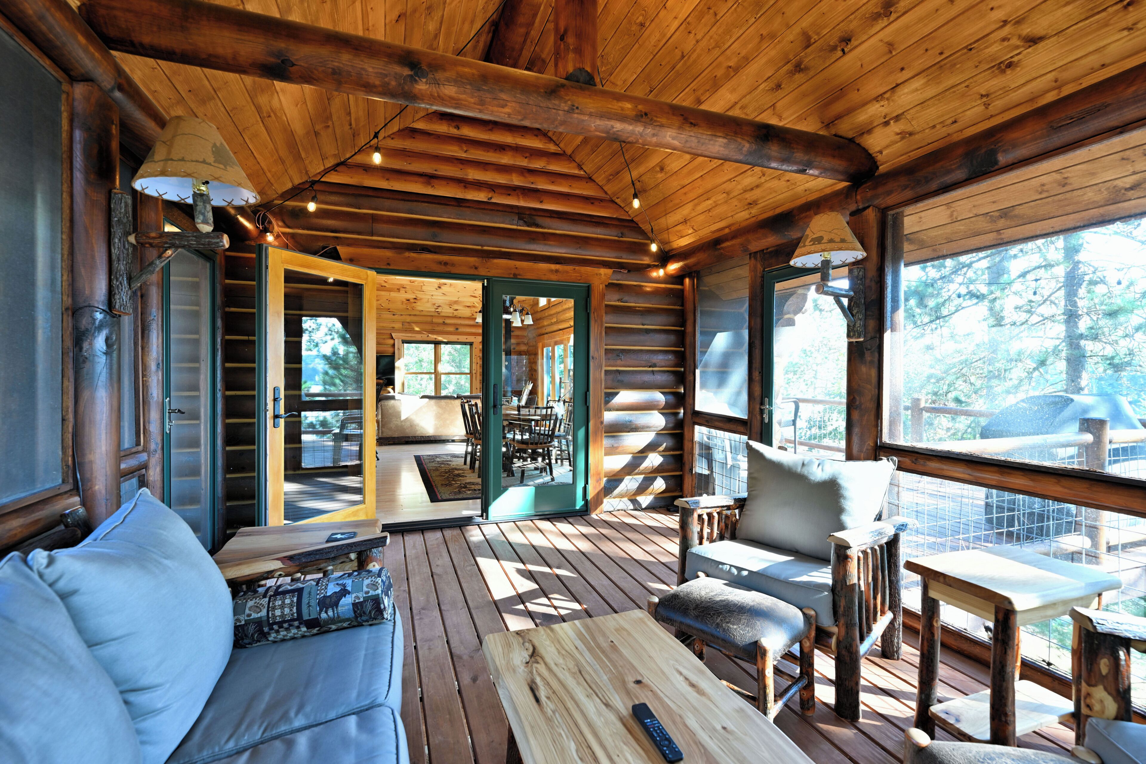 Another view of the porch and double doors leading to the dining area inside.