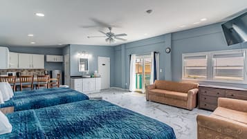 Premium Apartment, Multiple Beds, Patio, Ocean View | Living area | 32-inch TV with cable channels