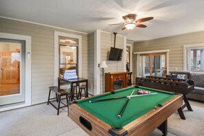 Smart TV, fireplace, video games, foosball