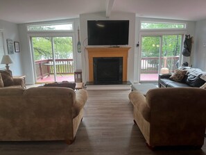 Smart TV, fireplace, foosball, books