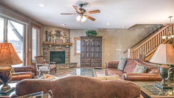 TV, fireplace, books