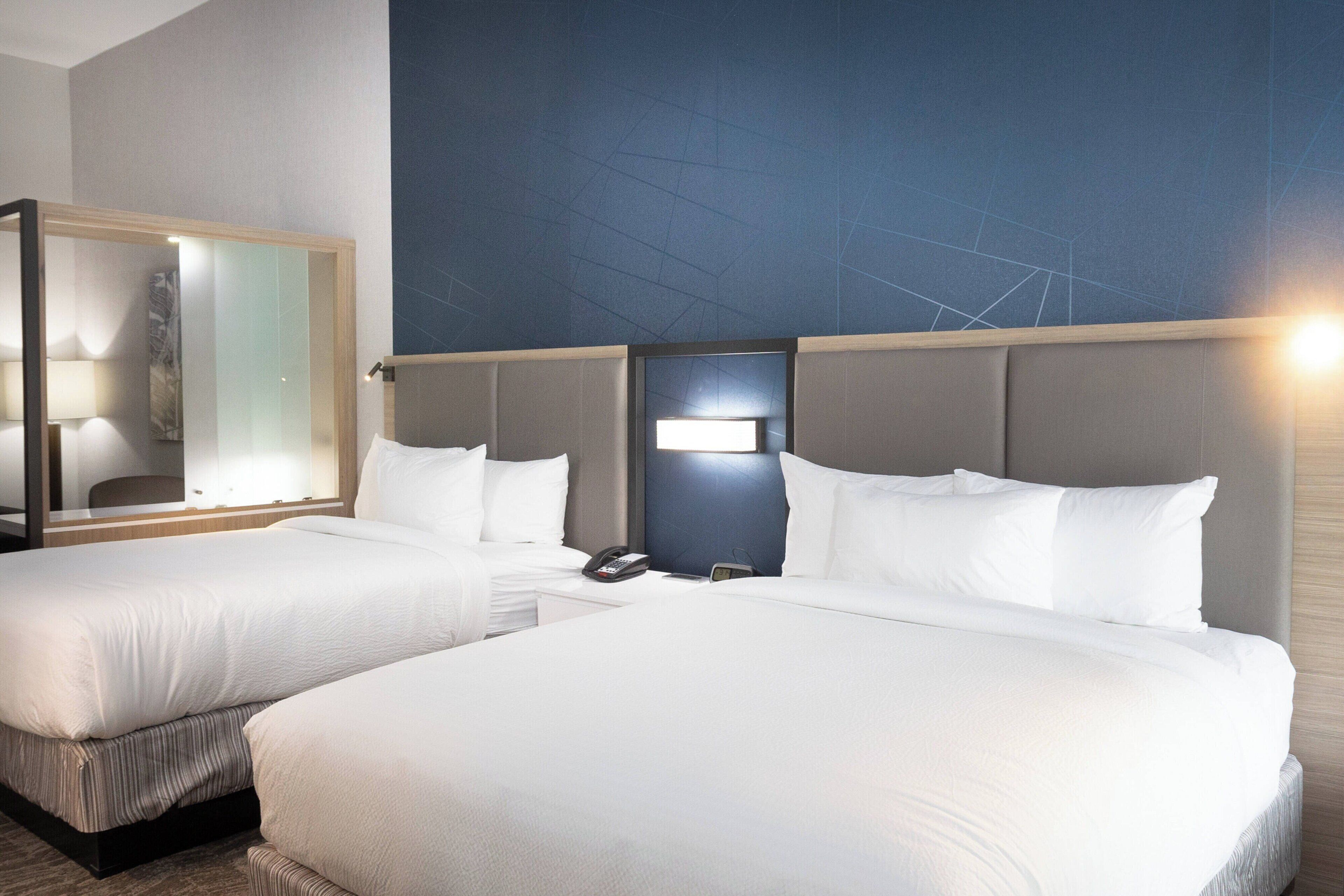 suite, multiple beds | 1 bedroom, desk, laptop workspace, iron/ironing board