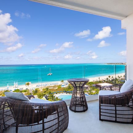 Deluxe Guest room, 2 Queen, Partial ocean view, Balcony | In-room safe, desk, free WiFi, bed sheets