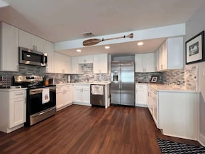 Coffee/tea maker, fridge, microwave, oven