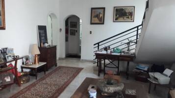 Shared Dormitory, 1 Bedroom, Patio | Living area | TV