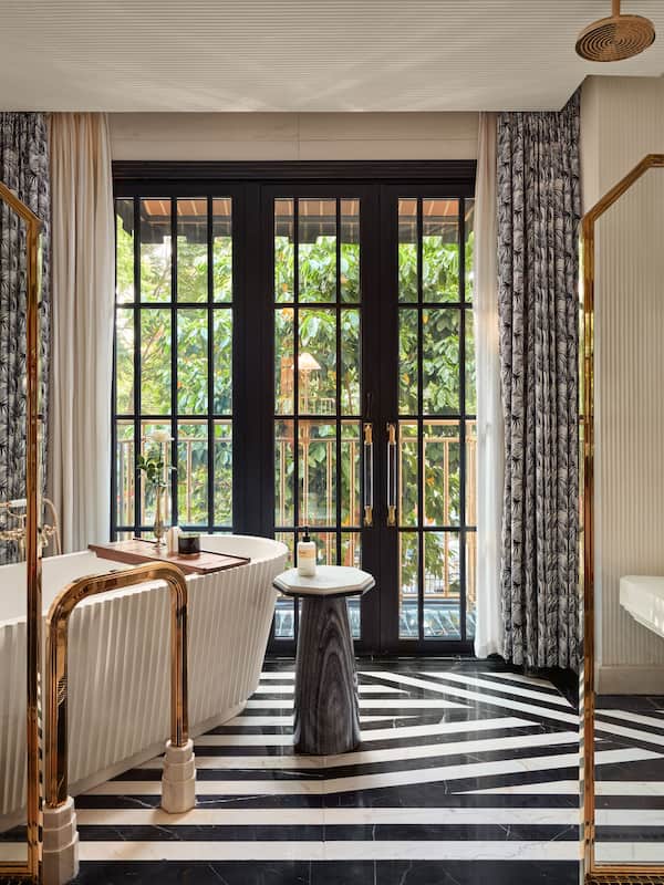 Suite (Capella) | Bathroom | Separate tub and shower, rainfall showerhead, designer toiletries