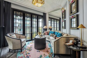 Suite (Capella) | Living area | 65-inch LED TV with satellite channels, TV, iPad