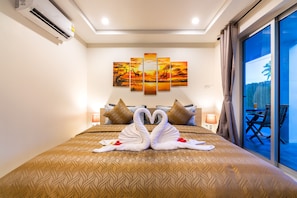 2 chambres, coffres-forts dans les chambres, fer et planche à repasser