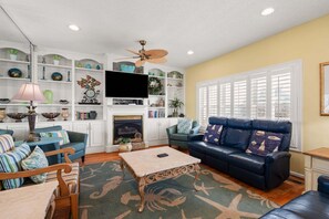 TV, fireplace - Luxurious oceanfront home with private pool, putting green, private beach access and more (North Myrtle Beach)