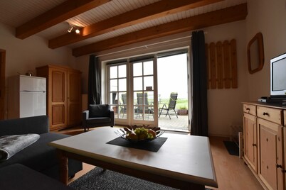 App.1 / 3-room (5 adults + 1 child), ground floor, with water view - Ferienwohnungen Zum