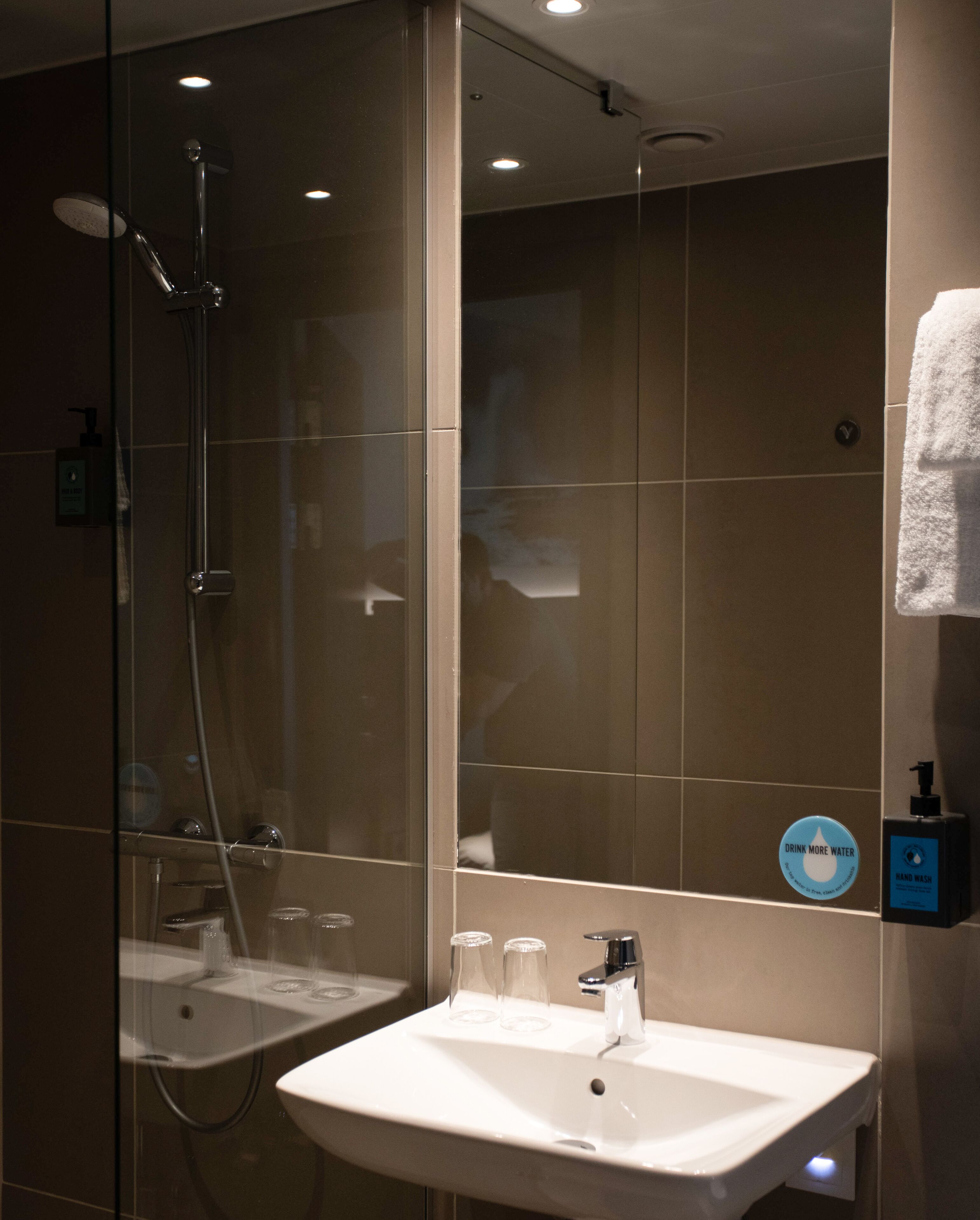 double room (compact) | bathroom | shower, free toiletries, hair dryer, towels