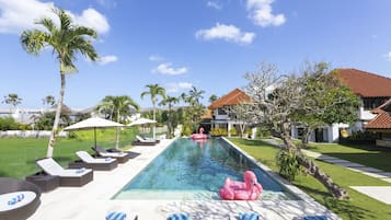 Outdoor pool, pool umbrellas, sun loungers