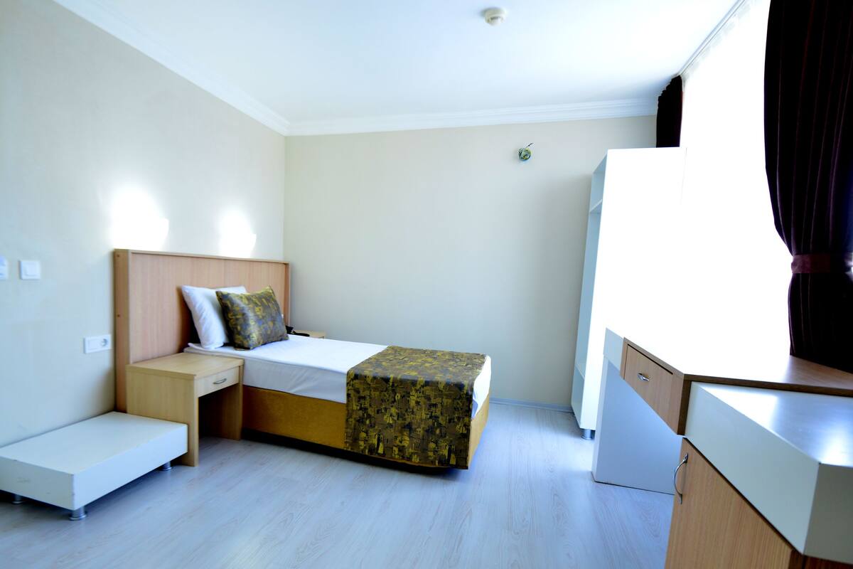 Family Room | Minibar, in-room safe, free cots/infant beds, free rollaway beds