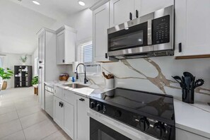 Fridge, microwave, oven, stovetop - Tripletail | Beachfront | Pool | Hot Tub (Anna Maria)