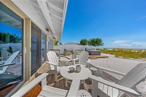Terrace/patio - Serendipity Gulfront | Hot Tub | Heated Pool | Golf Cart (Anna Maria)