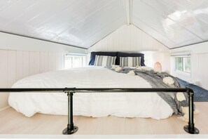 1 dormitori i roba de llit 